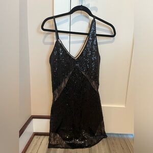 Black dress with lace details from Express size SX